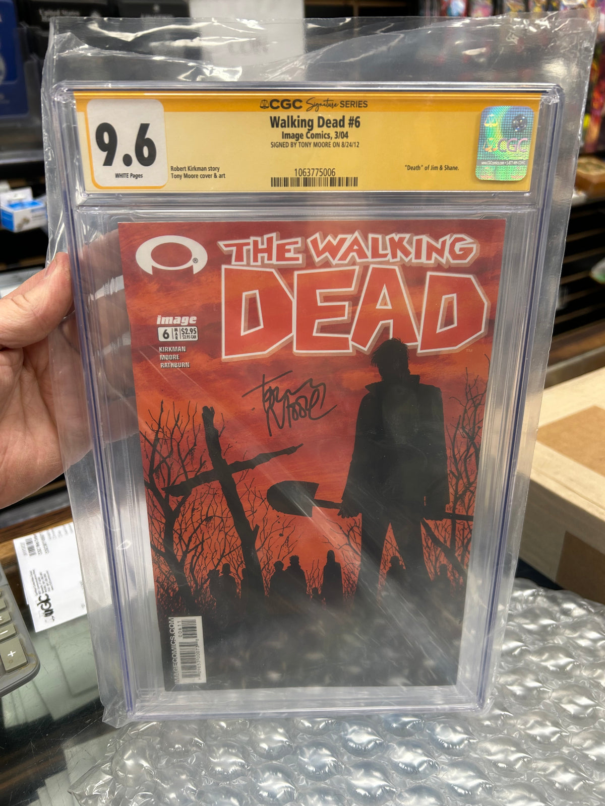 Walking Dead #6 (White Pages) {CGC 9.6} Signed by Tony Moore